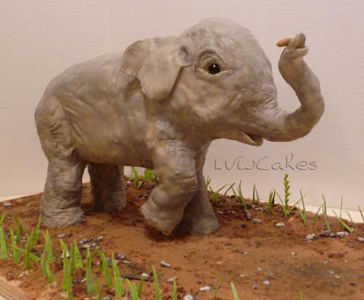 Little Elephant With Mouse Cake